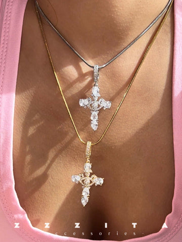 wearing Bling Cross Necklace in gold and silver