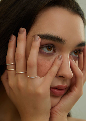 wearing stacked Classic Silver Rings