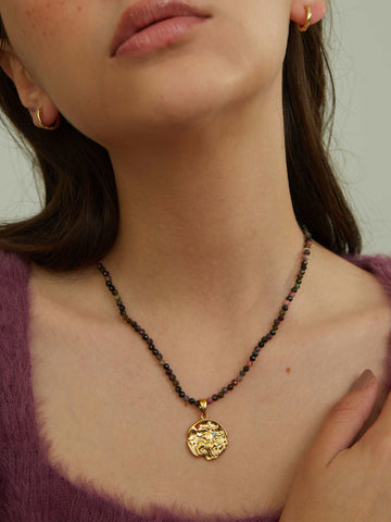wearing Custom Bella Zodiac Sign Necklace