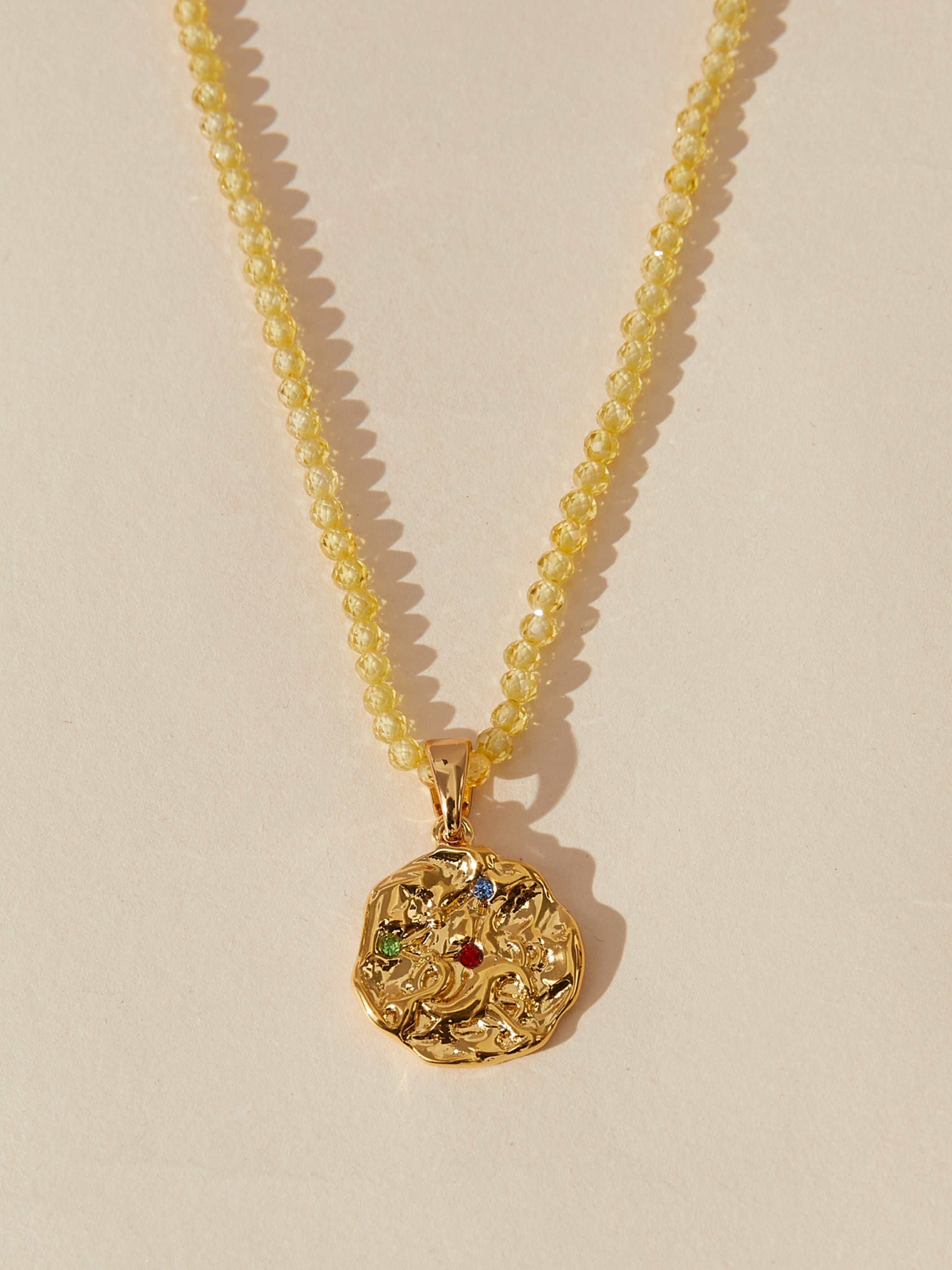 yellow zircon zodiac necklace