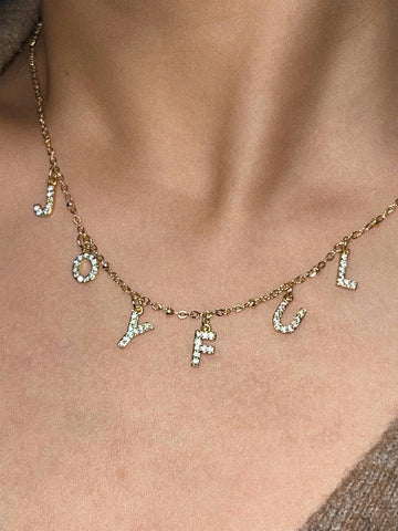 wearing Custom Roxy Letter Necklace