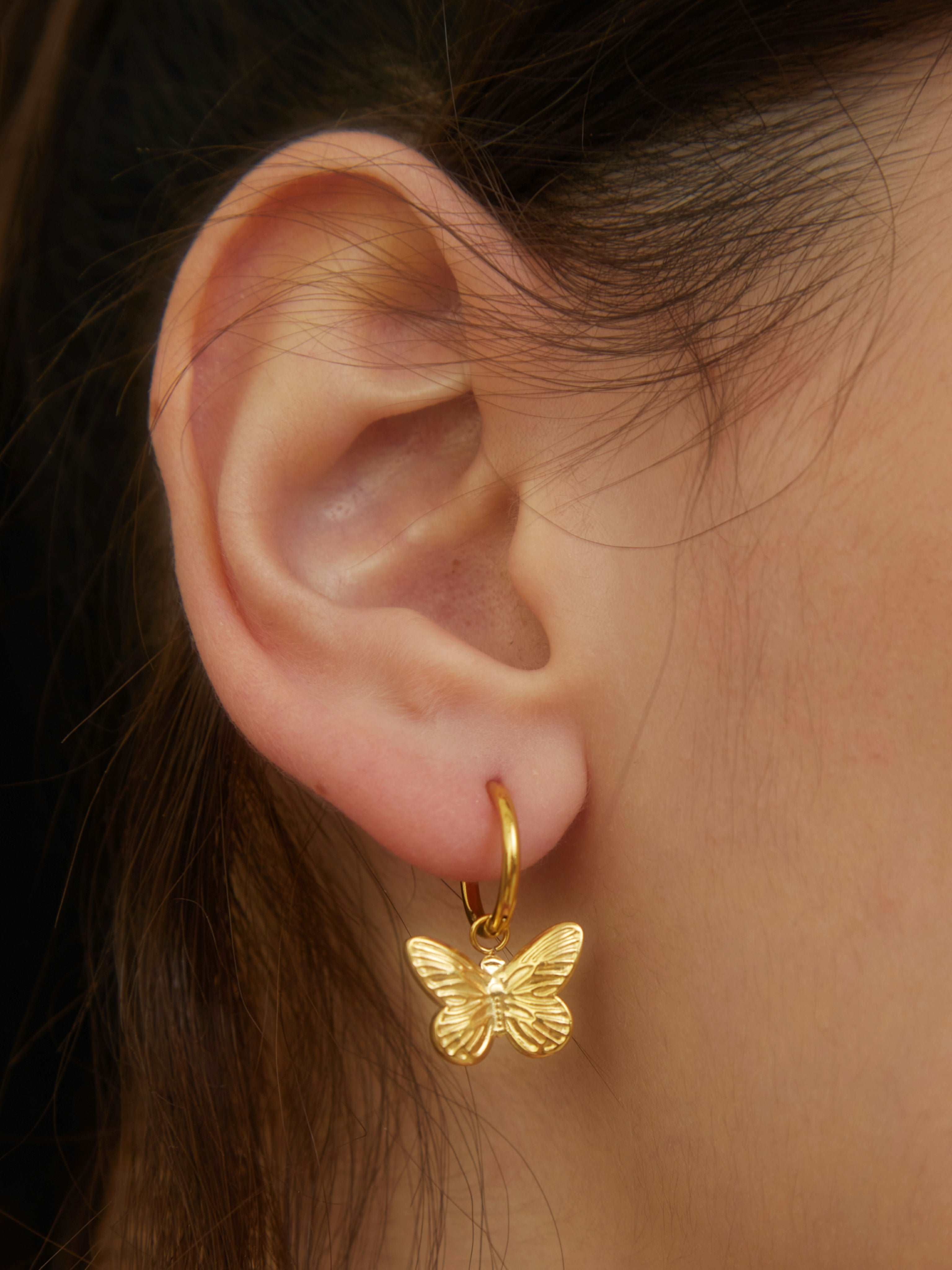 wearing Grace Gold Butterfly Earrings