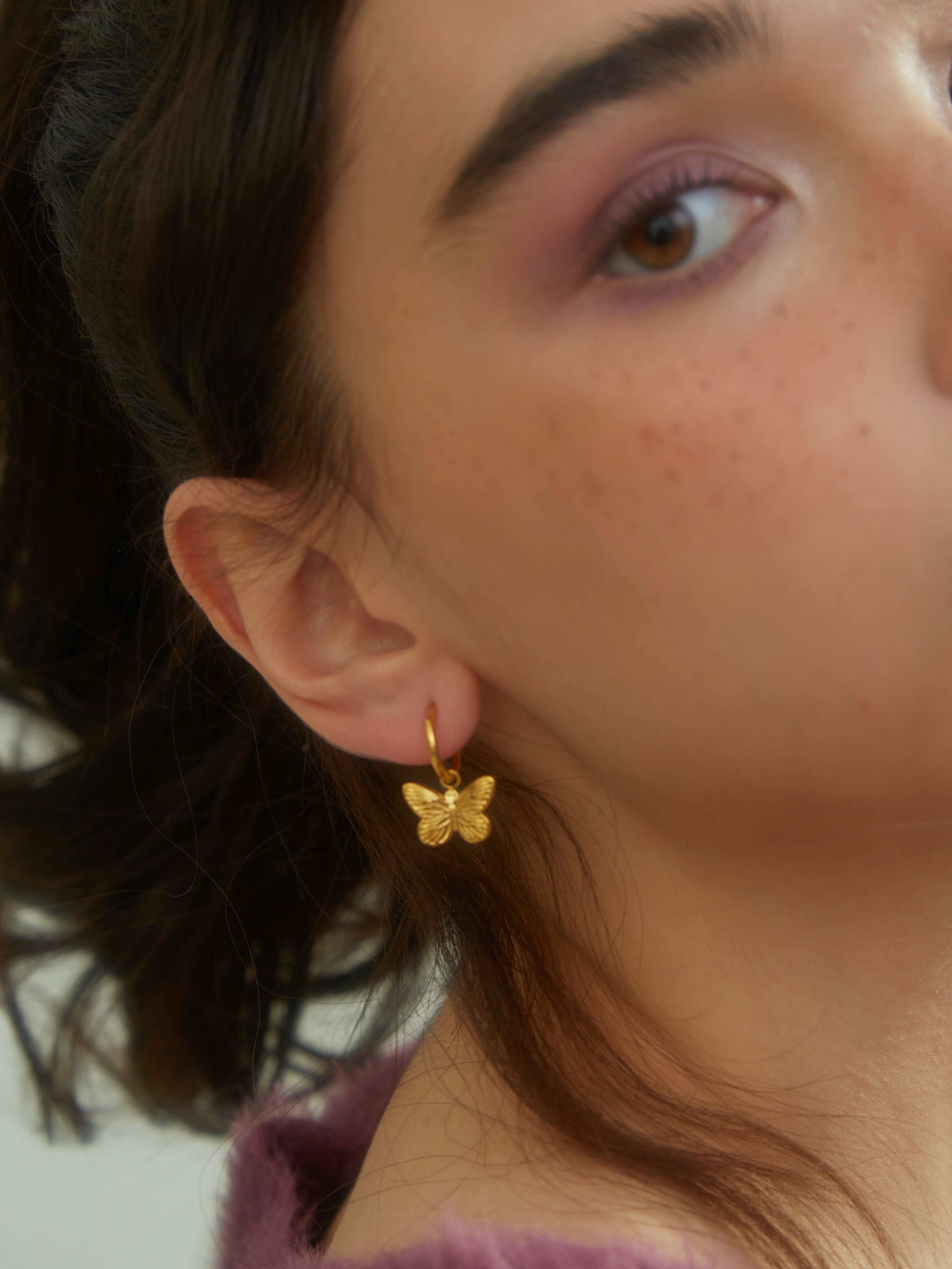wearing Grace Gold Butterfly Earrings