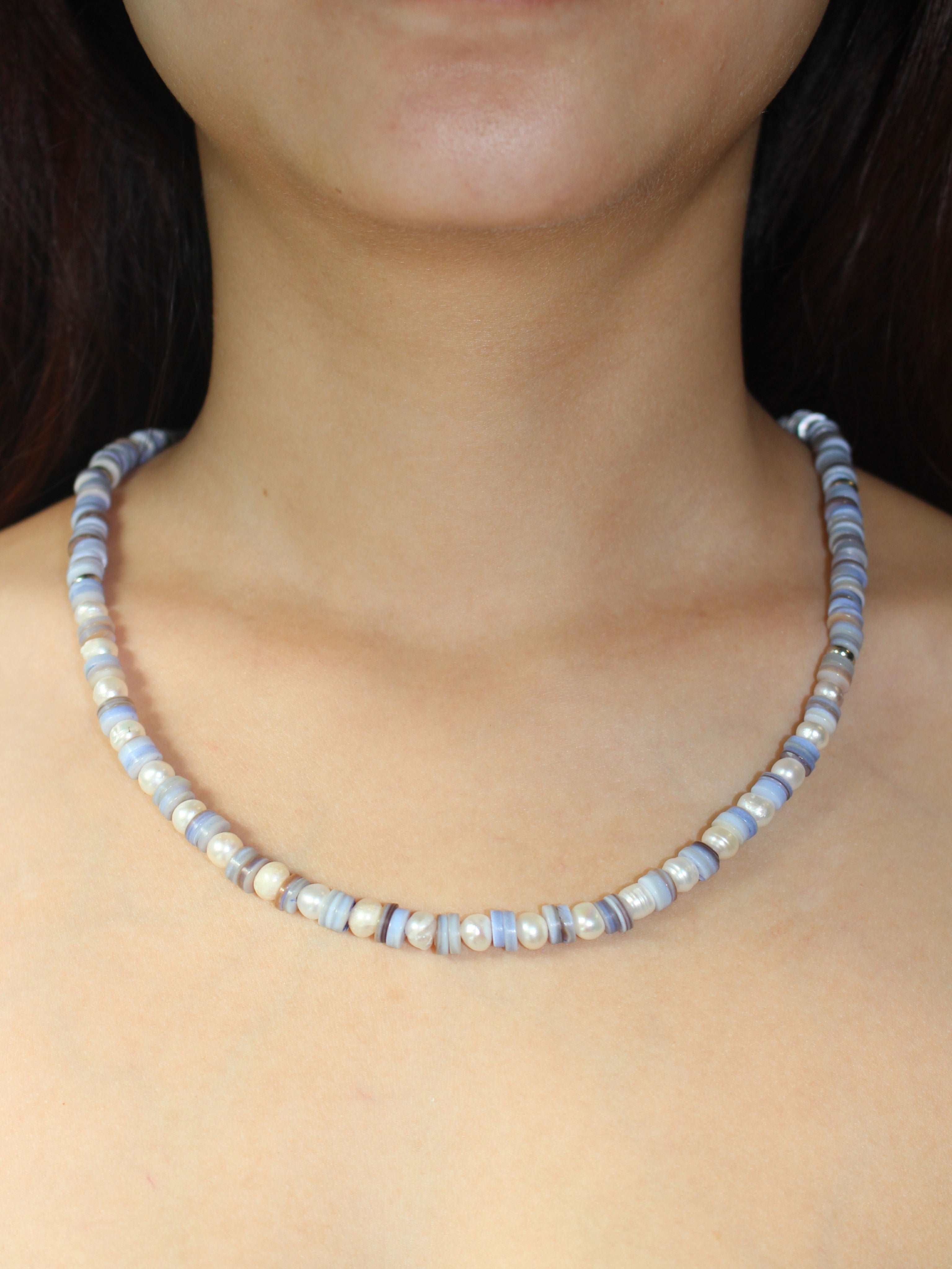 wearing Handmade Mother of Pearl Bead Necklace