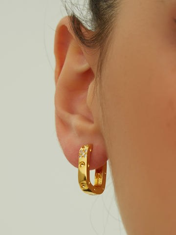 wearing Harper Square Earrings in gold