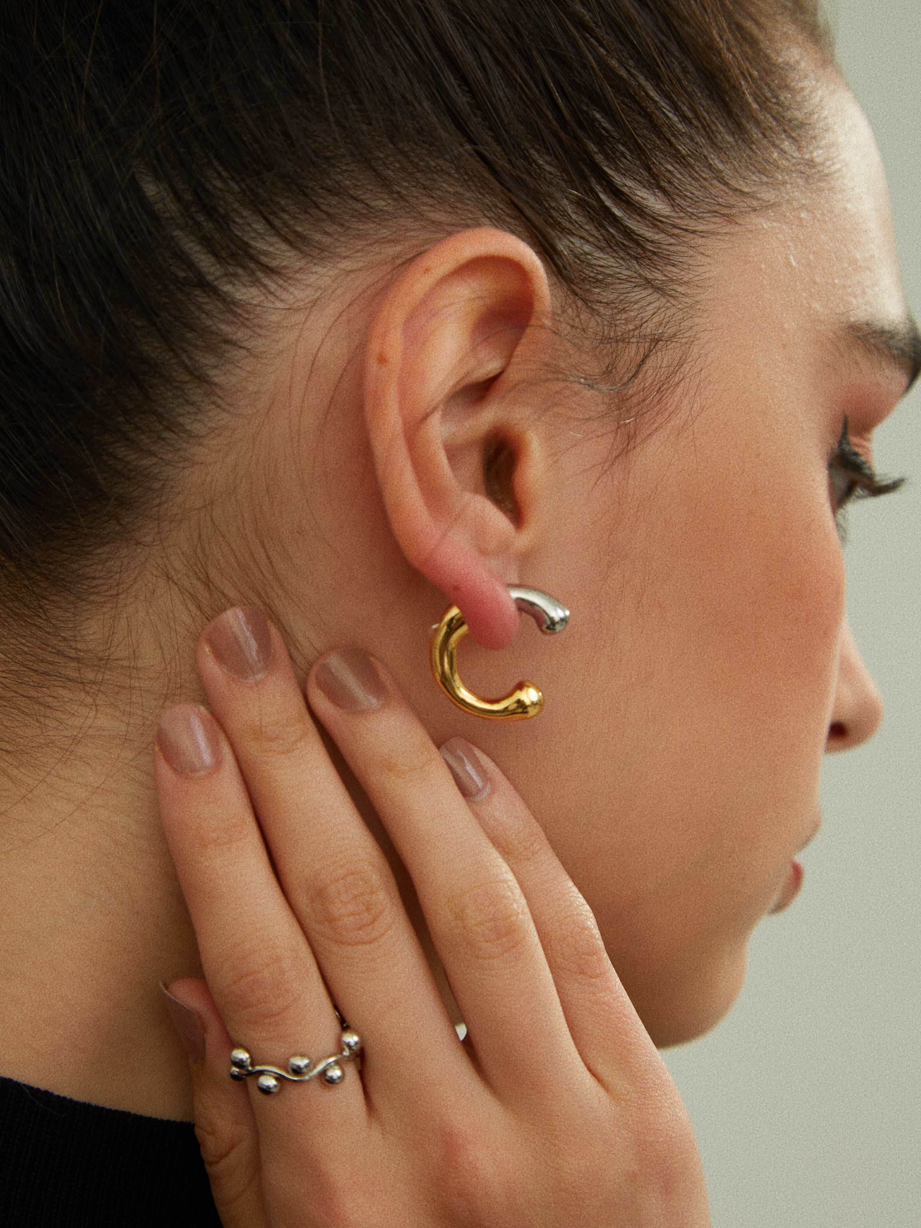 wearing Isabella Contrast Hoops and mini structure ring