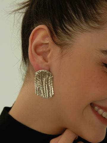 wearing silver Lucia Specular Surface Earrings