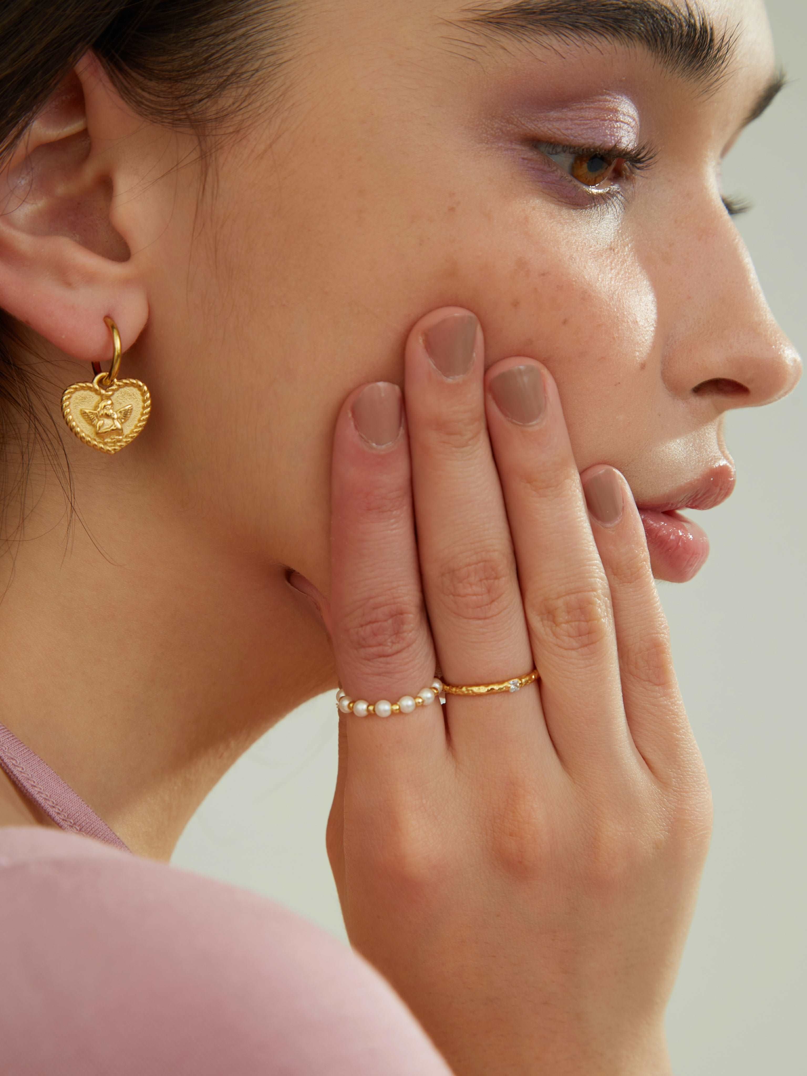wearing Mia Pearl Beaded Ring, thin gold ring and Kayla gold ring