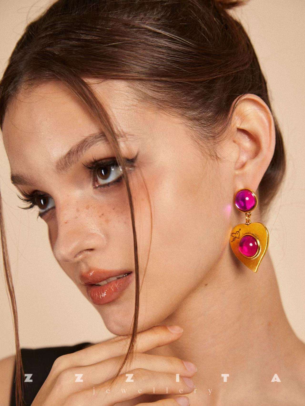 wearing Pink Gemstone Love Earrings